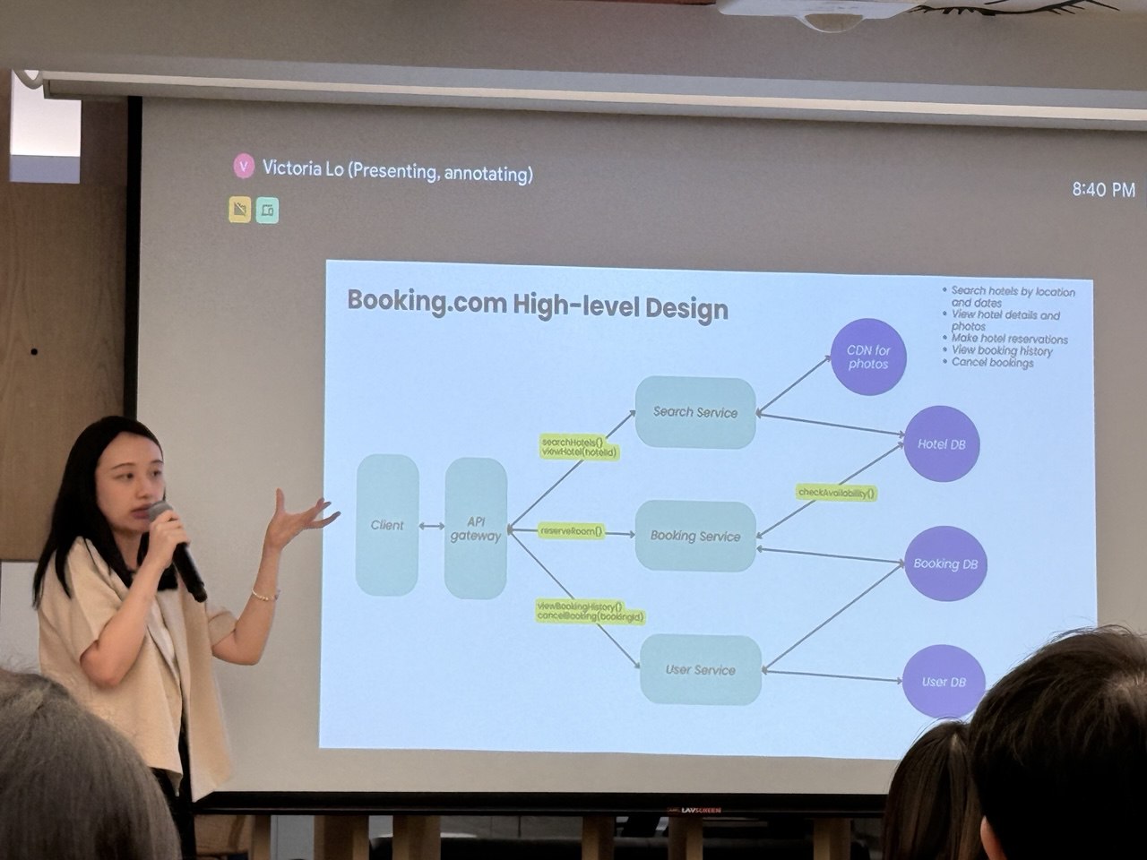 Victoria presenting a system design workshop to an audience